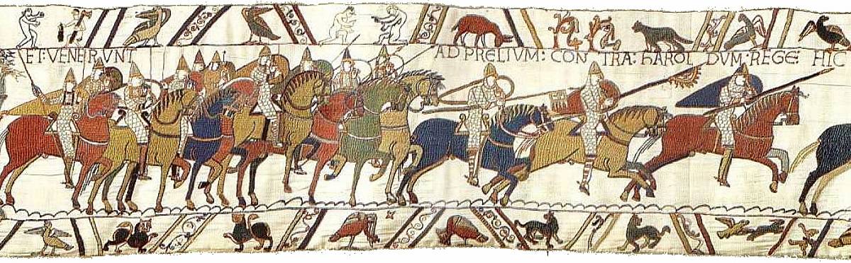 Szene aus dem „Teppich von Bayeux“: In der Schlacht bei Hastings rückt das normannische Heer gegen die Angelsachsen vor (Wikimedia Commons)